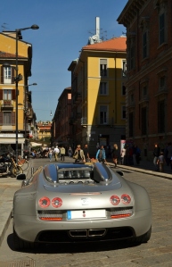 Nadia Mikushova. A view to the Brera street in Milan and a Bugatti car parked.