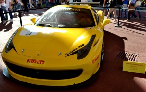 Nadia Mikushova. A front view to a Ferrari car exposed at the EXPO2015.