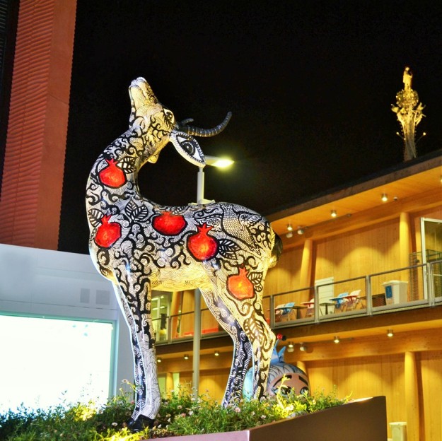 Nadia Mikushova. A night view to the Azerbaijan EXPO Milano 2015 pavilion fawn statue.s